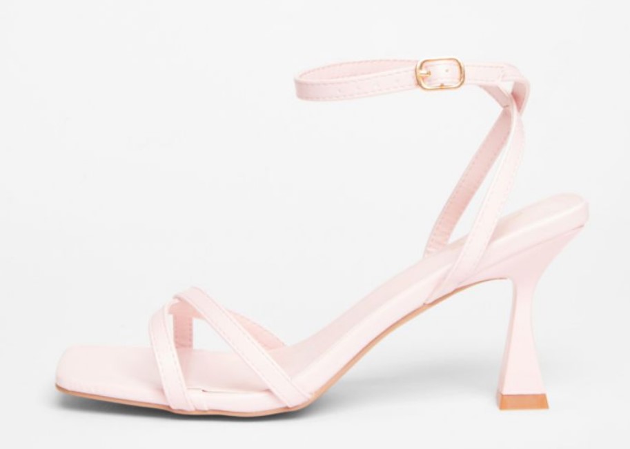 Light pink faux‑leather open‑toe heels with thin straps and an 8 cm flared heel.