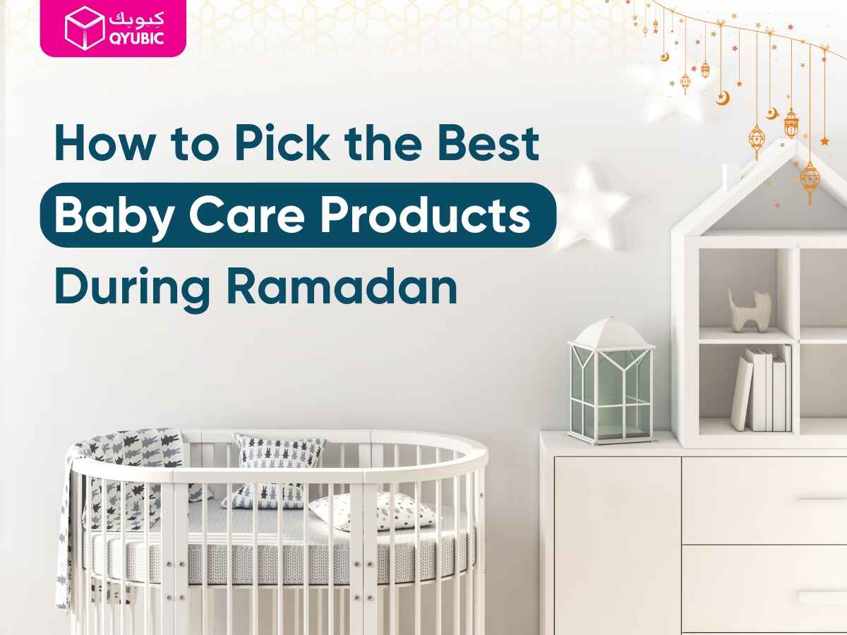 White baby crib in a minimalist nursery with a Ramadan lantern and gold star ornaments, promoting Qyubic’s guide on selecting the best baby care products during Ramadan.