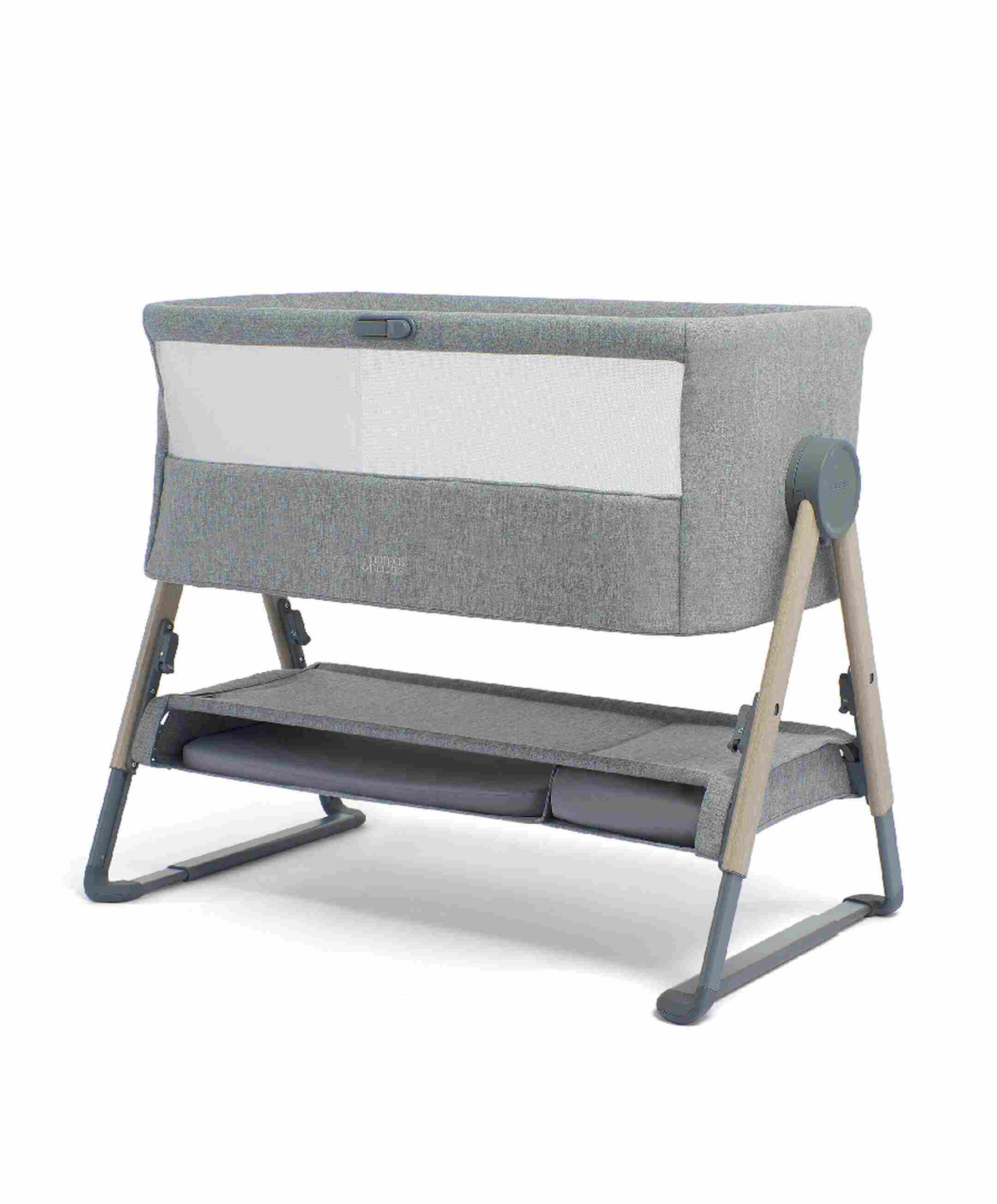 Lua bedside crib with breathable mesh panels, auto-return adjustable side, and built-in changing mat – an ideal baby bassinet for infants up to 6 months.