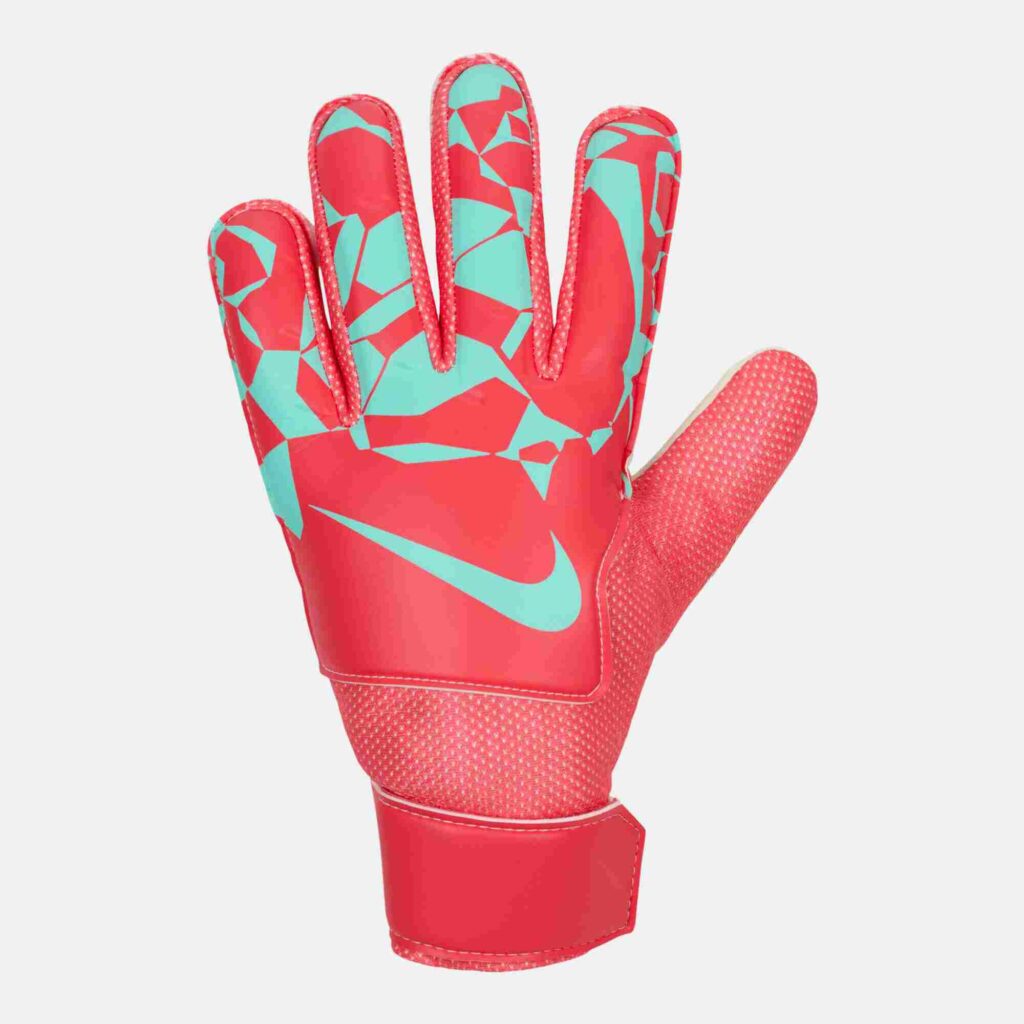 Image of a kid's football gloves  by Nike in peach  .