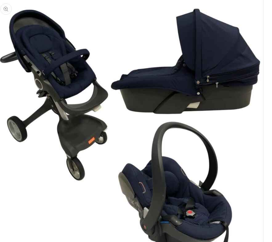 Stokke Xplory travel system stroller bundle featuring a high seat, bassinet, car seat, and storage bags – a versatile pram stroller for newborns up to 2 years old