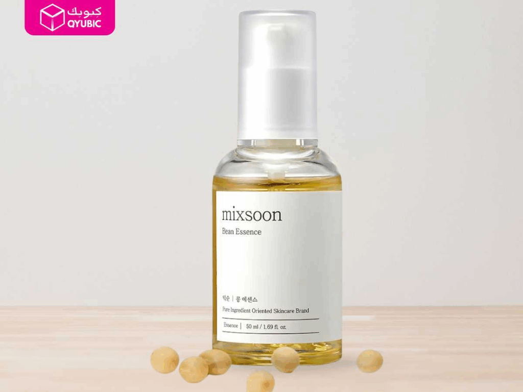 Mixsoon Bean Essence in a clear bottle with soybeans around, a simple yet powerful Korean skin care product highly rated in the UAE for nourishing and revitalizing skin.