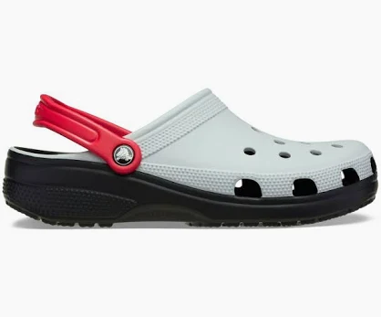 White Crocs classic clog with black sole and red strap
