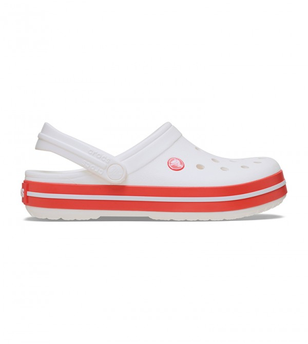 White Crocs clog with red stripe sole